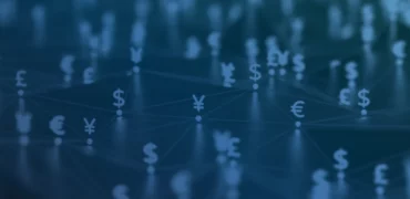 Currency symbols as game pieces on a board