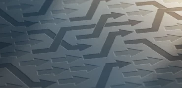 Two colors of arrows, brown and tan, some moving straight and others zig zag